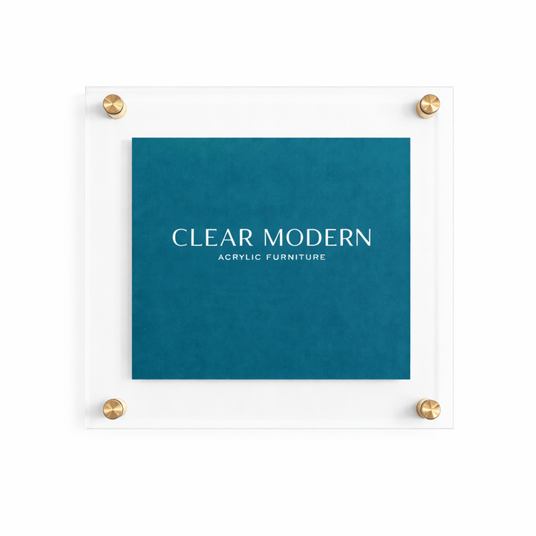 Clear modern 15x15 acrylic picture frame with gold accent hardware on each corner.