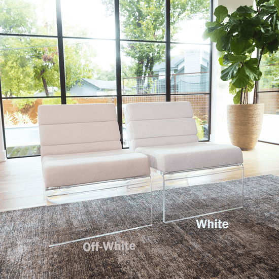2 acrylic lucite lounge chairs with white cushions placed in a modern living room with many large windows. These chairs feature the white and off-white upholstery choices.