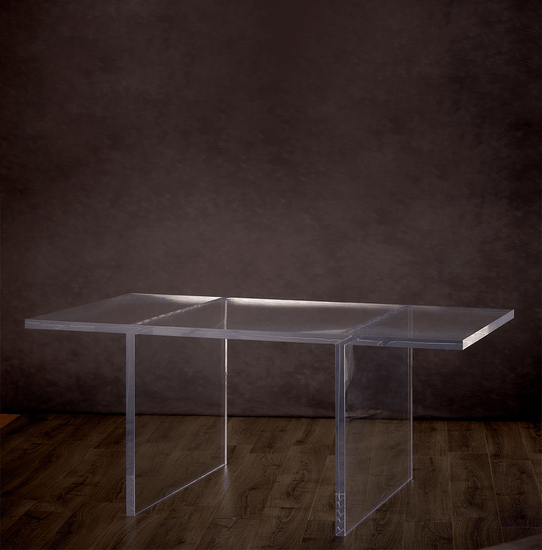 Catalog view of a clear acrylic slab style dining room table on a hardwood floor.
