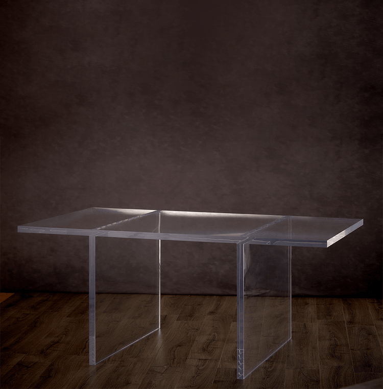Catalog view of a clear acrylic slab style dining room table on a hardwood floor.