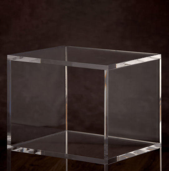 Catalog closeup of the edges on a clear acrylic slab nightstand.