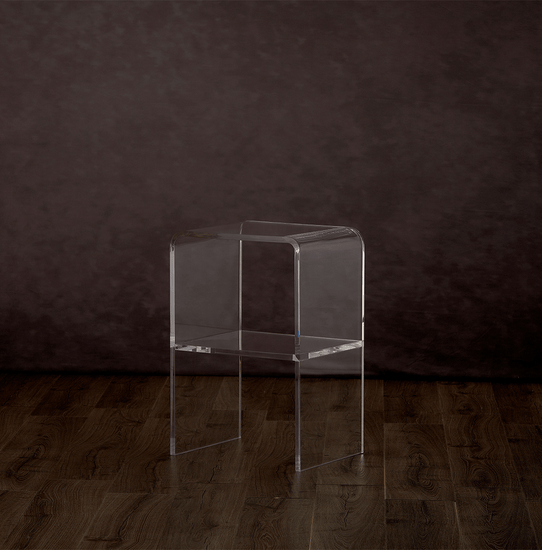 Clear acrylic 1 interior shelf nightstand on a hardwood floor.