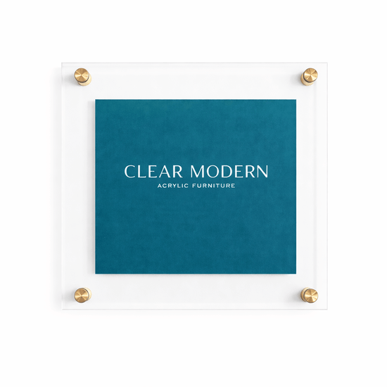 Clear modern 15x15 acrylic picture frame with gold accent hardware on each corner.
