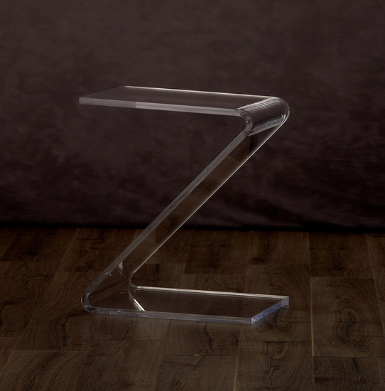 Catalog view of a clear acrylic waterfall edge z shaped end table on a hardwood floor.