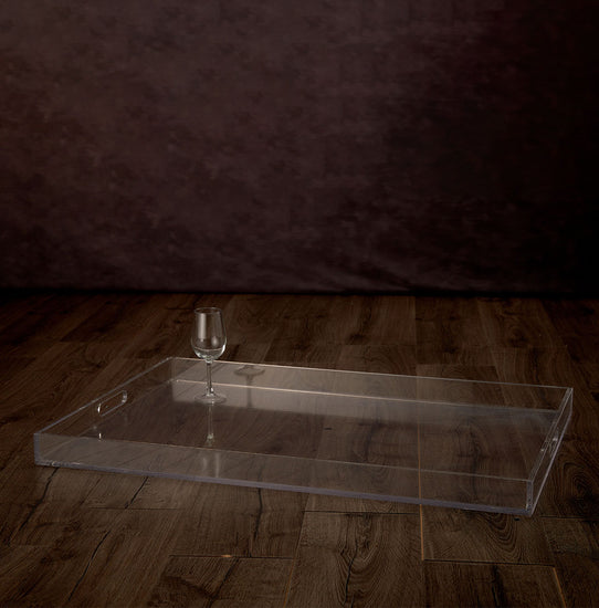 Clear acrylic serving tray with sides displaying 1 wine glass for size comparison.